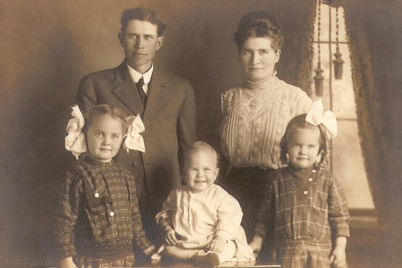 Clyde and Edith Land with children